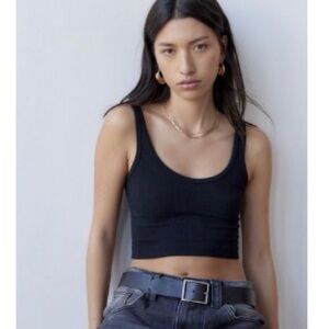 out from under drew tanks (two)